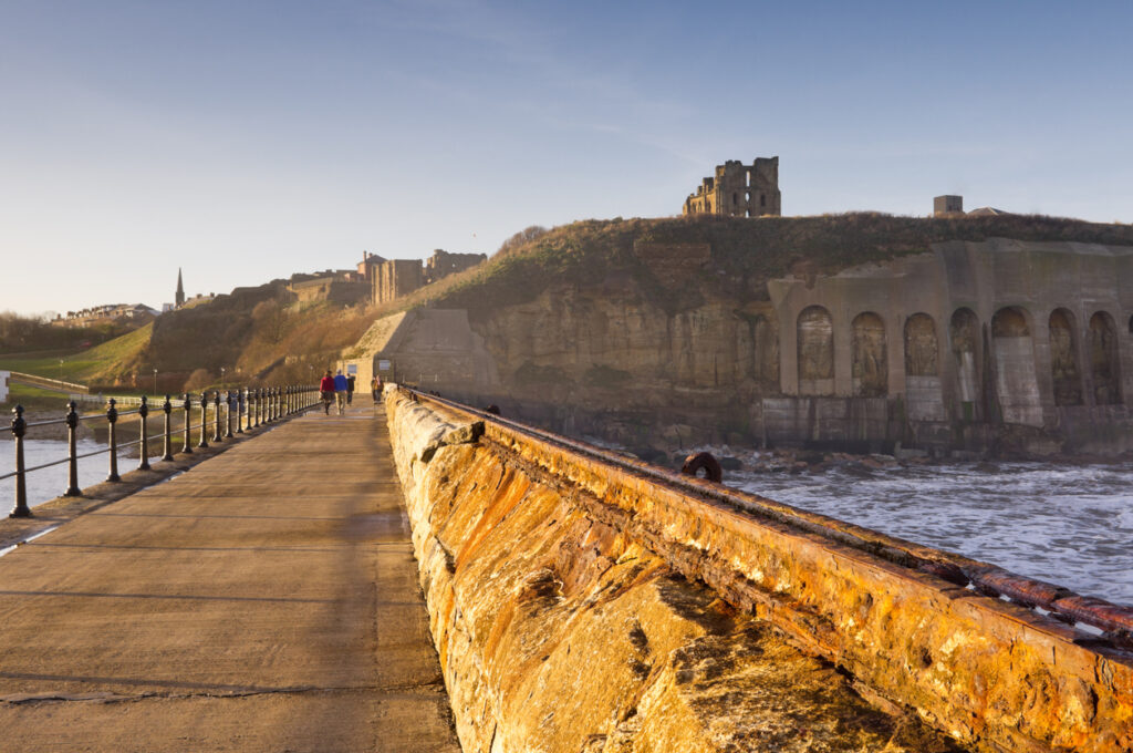 Looking back to land from the north pier with the priory and Tynemouth beyond